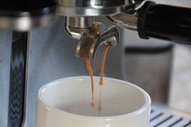 espresso-coffee-flowing-into-cup